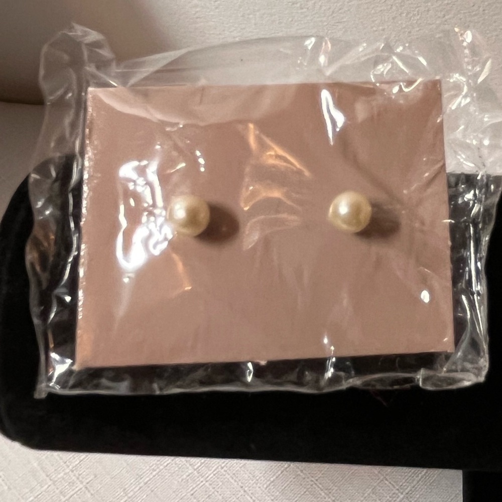 Avon Pearlized Pierced Earrings with stainless steel posts. New. Vintage.